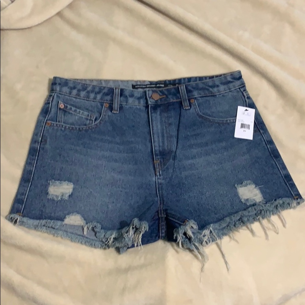 Mid Ride Distressed Denim Shorts